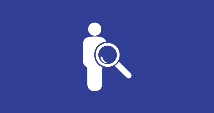 person with magnifying glass icon